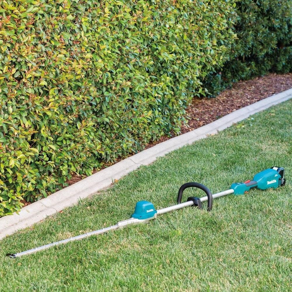 image:imageMakita XNU02T LithiumIon Brushless Cordless 50Ah 18V LXT 24 Pole Hedge Trimmer Kit TealPole Hedge Trimmer Kit