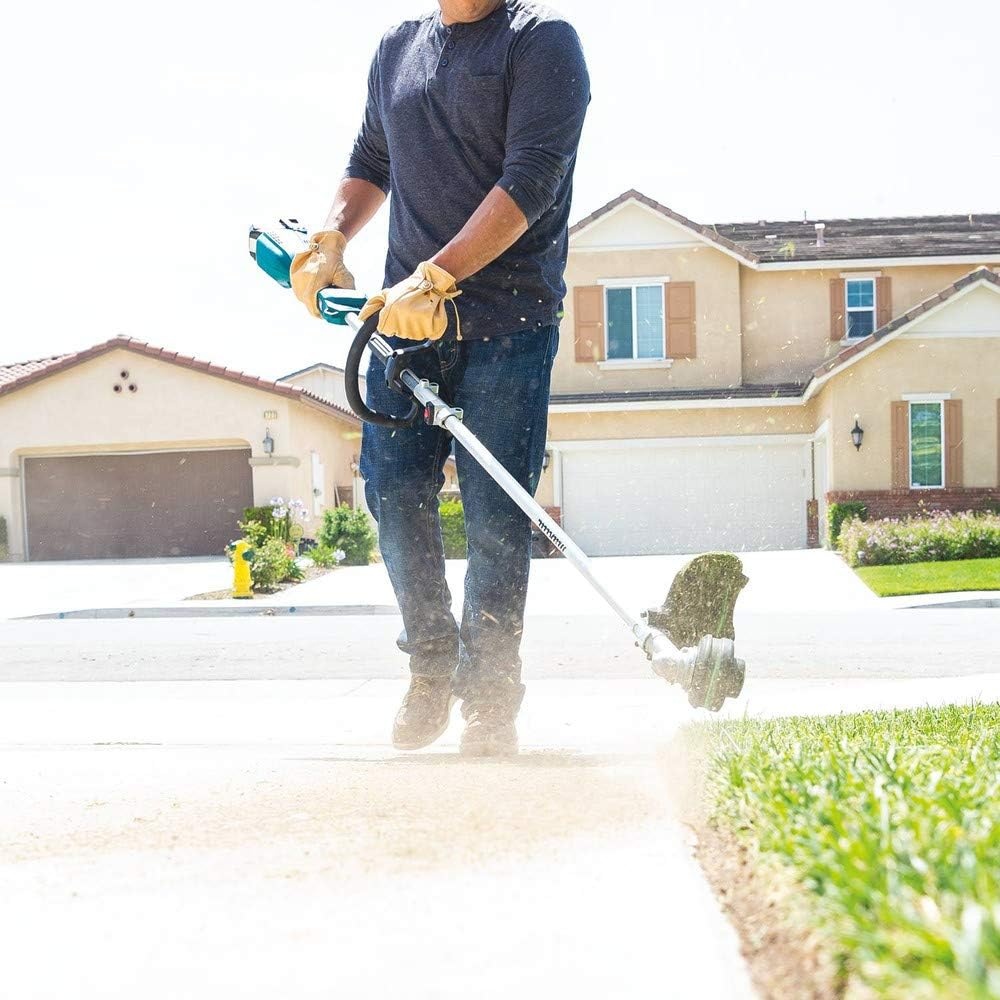 image:imageMakita XUX02SM1X1 18V LXT LithiumIon Brushless Cordless Couple Shaft Power Head Kit w 13 String Trimmer Attachment 40Ah Power Head Kit with 13 In Trimmer Includes 40ah Battery and Charger Up to 7 000 Rpm 13 In Cutting Swath XptCouple Shaft Power Head Kit